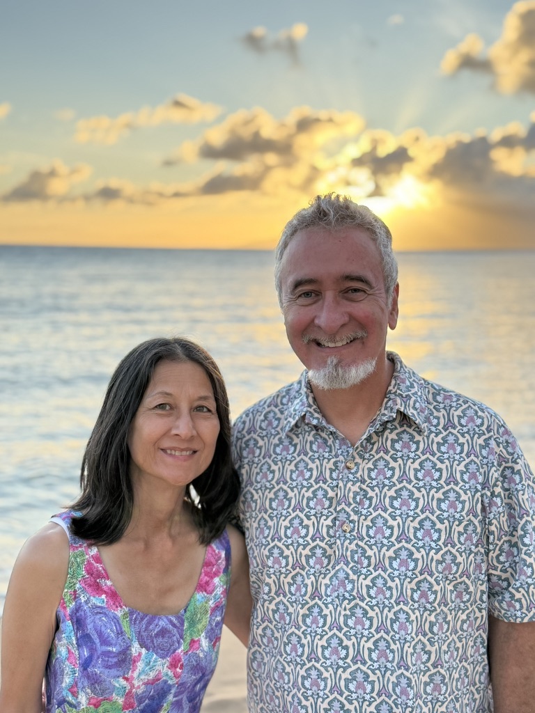 Maureen and Dano Keys together at sunset on a beach